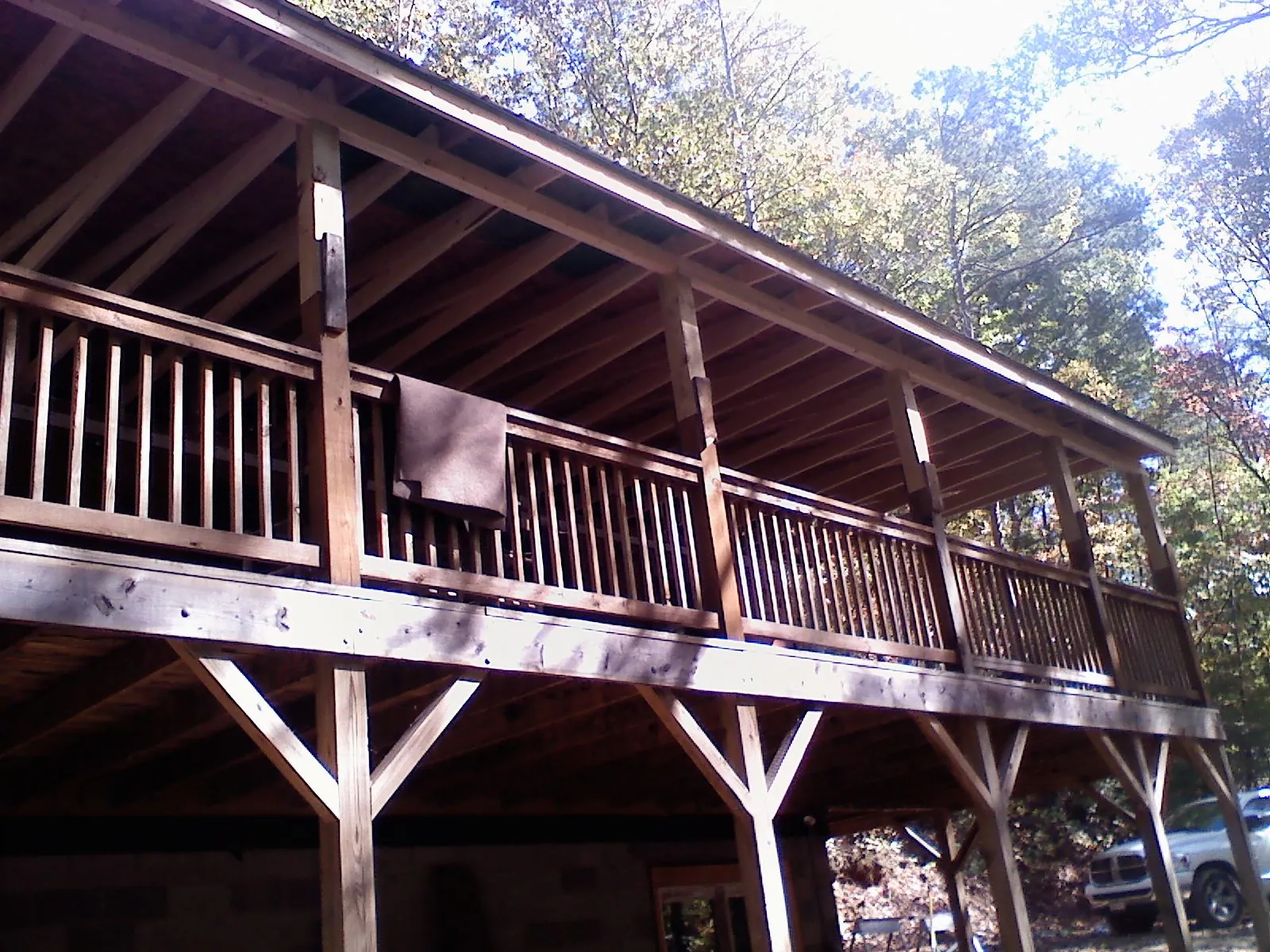 Timber framing under a new elevated porch and deck — Roof Leak Repair in Luther by Roofing Brothers